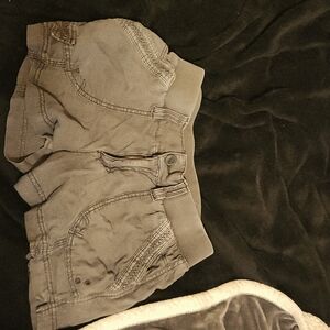 Gray booty shorts, brand is Maurice's, size small
